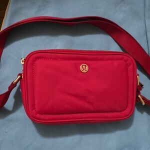 Lululemon Athletica Red Bag with Gold Zipper